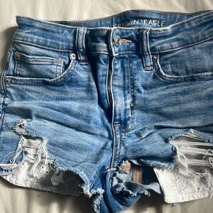 slightly worn American eagle shorts